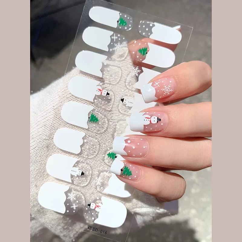 Festive Christmas-themed French semi-cured gel nail stickers - holiday nail strips with elegant French tips, designed for easy, at-home application. Perfect for holiday nail art with a long-lasting, salon-quality finish.